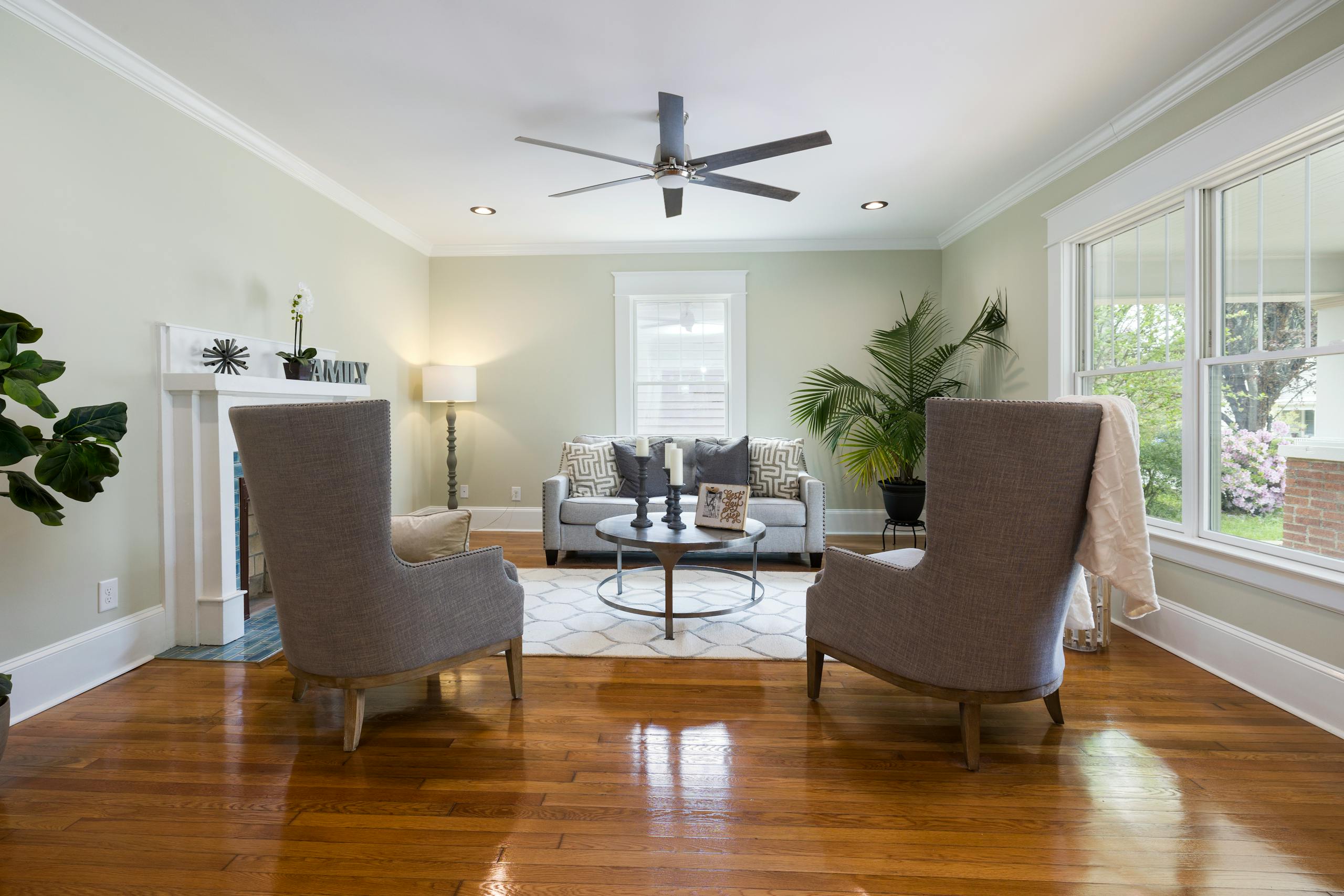 A beautifully designed minimalist living room showcasing modern furniture and natural light.
